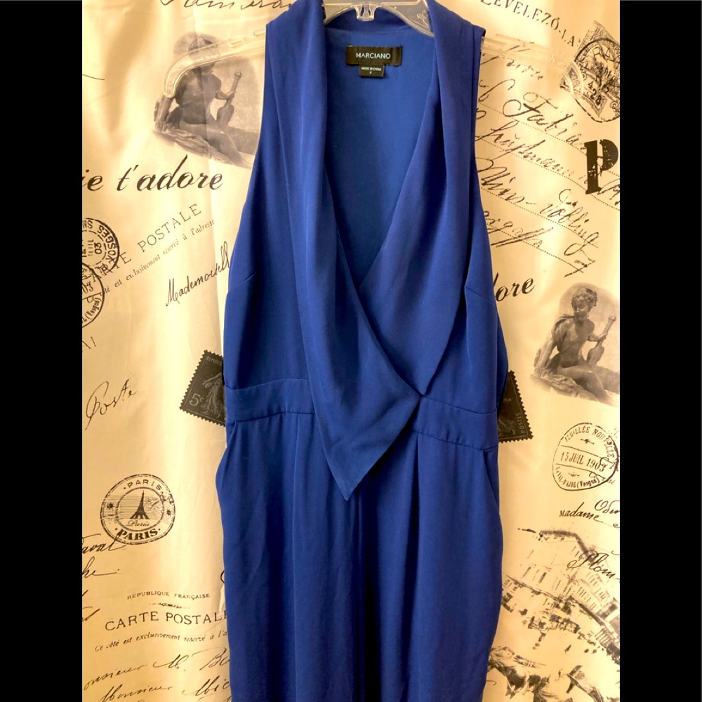 Guess jumpsuit new with tags size 2